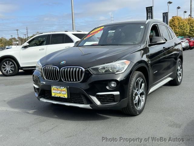 Used 2018 BMW X1 28i with VIN WBXHT3C30J5K27844 for sale in Riverhead, NY