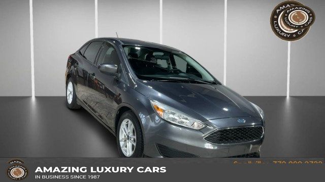 2018 Ford Focus SE Sedan - 22969575 - 0