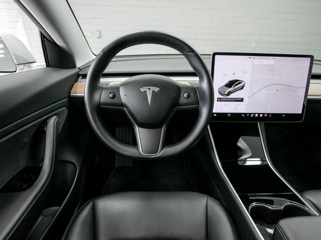 Tesla Model 3 photo 13