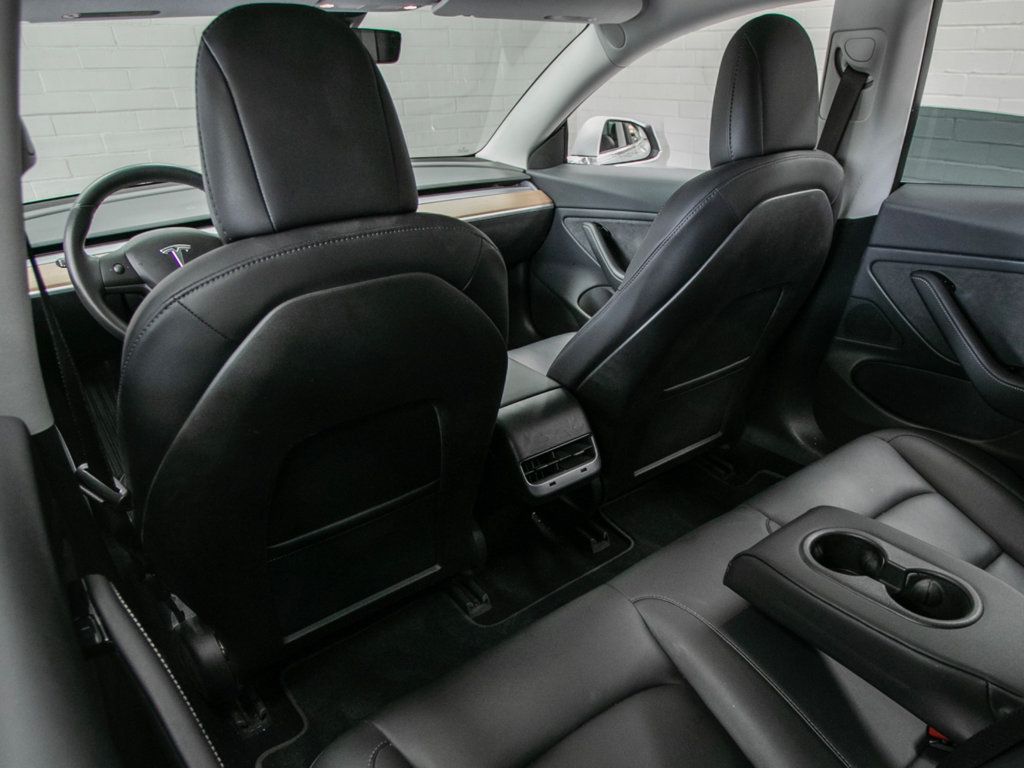Tesla Model 3 photo 17