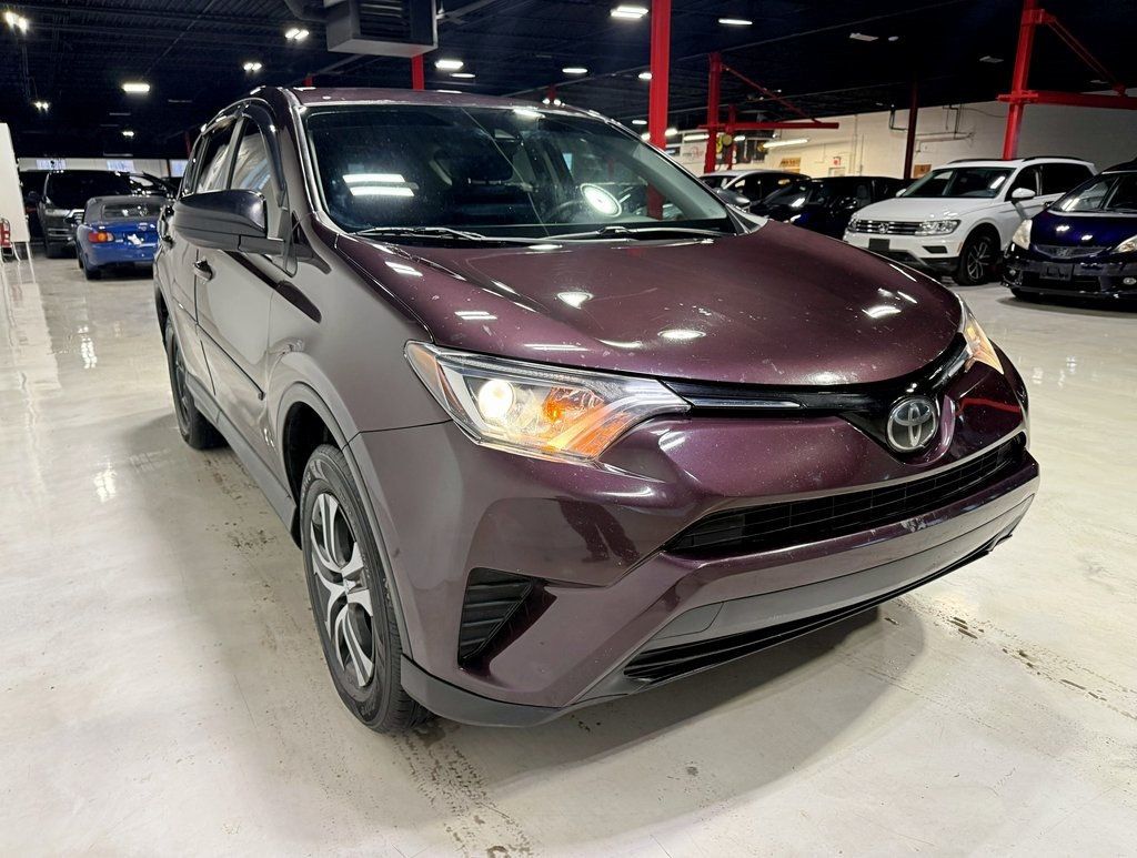 2018 Toyota RAV4 LE AWD - 22952187 - 7