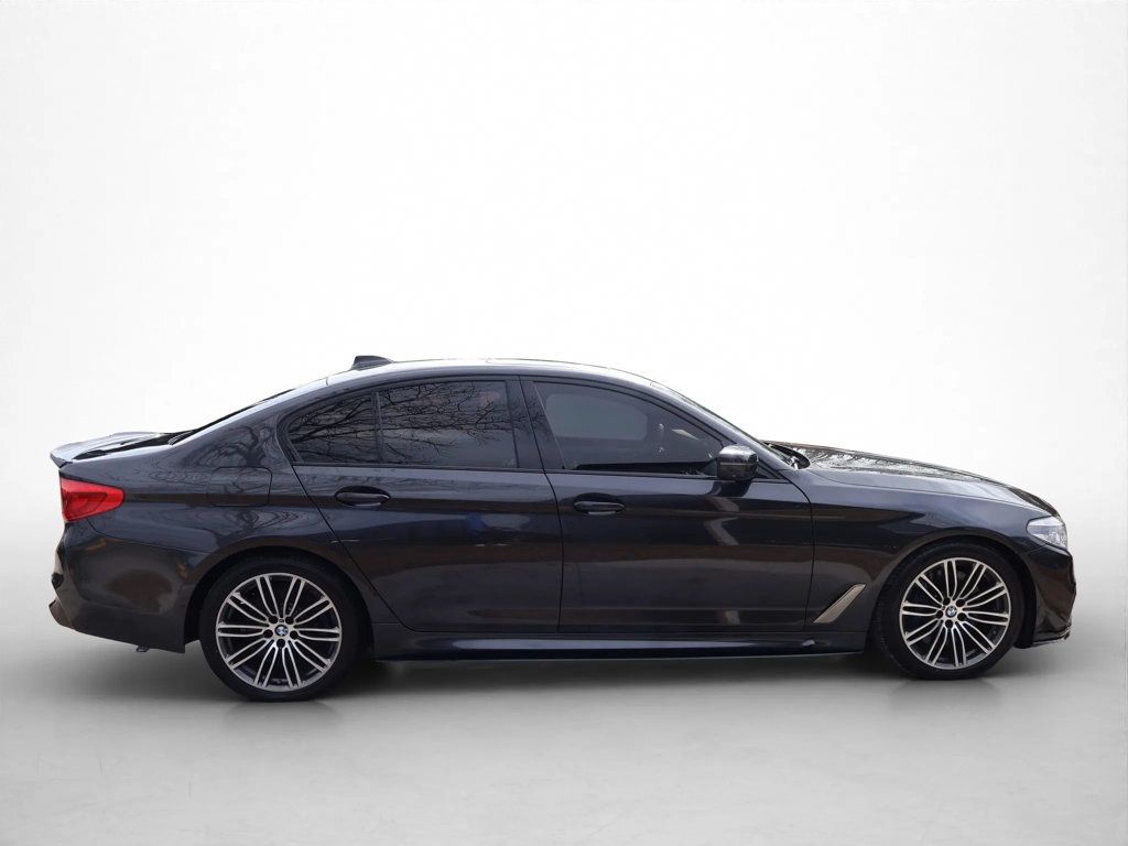 2019 BMW 5 Series M550i xDrive - 23042175 - 4