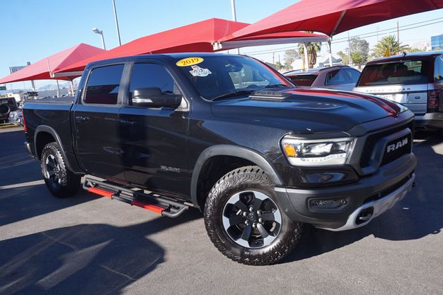 2019 Ram 1500 REBEL, 4X4, PREMIUM WHEELS, ALL TERRAIN TIRES, RUNNING BOARDS - 23050237 - 1