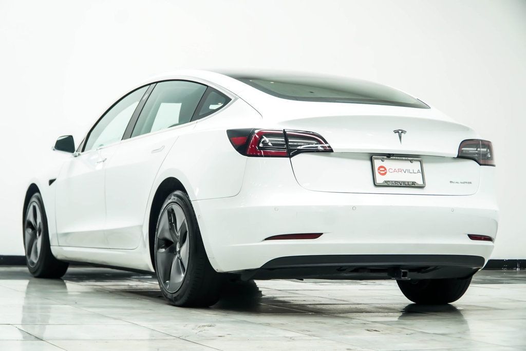Tesla Model 3 photo 11