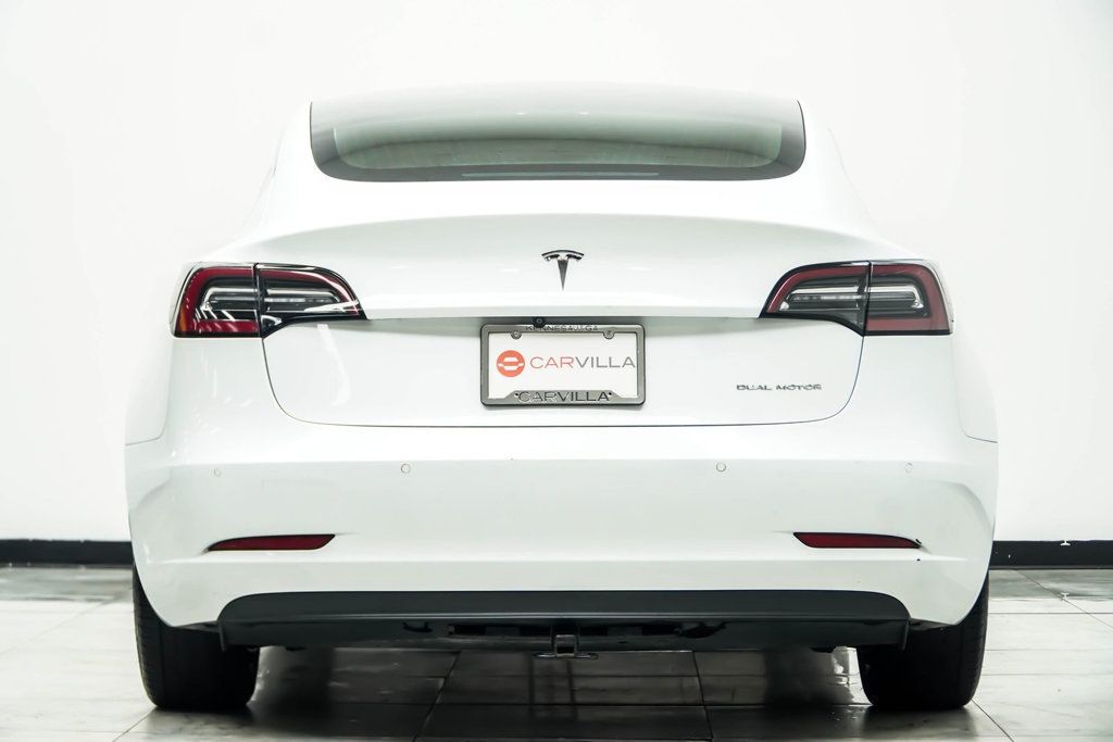 Tesla Model 3 photo 12