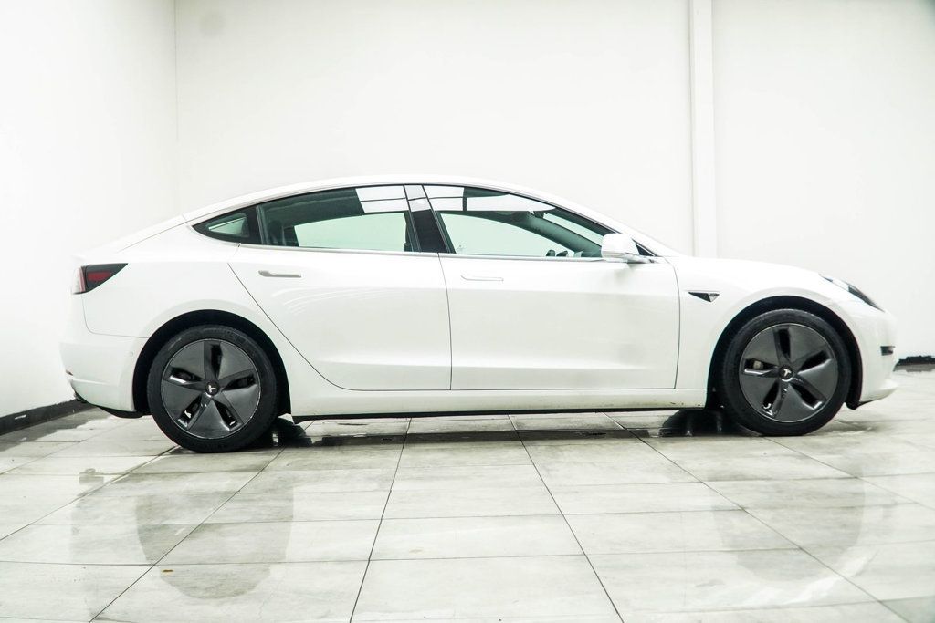 Tesla Model 3 photo 7