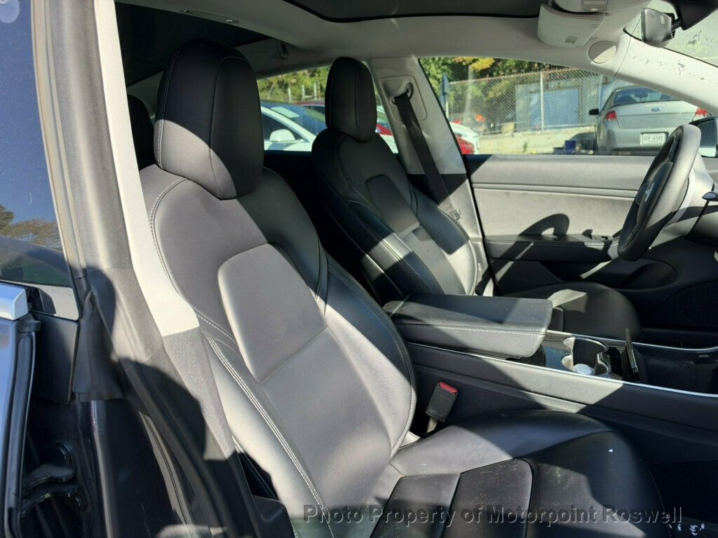 Tesla Model 3 photo 10