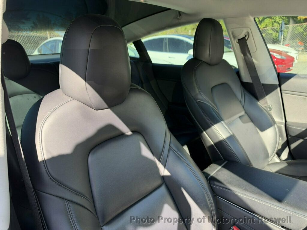 Tesla Model 3 photo 11