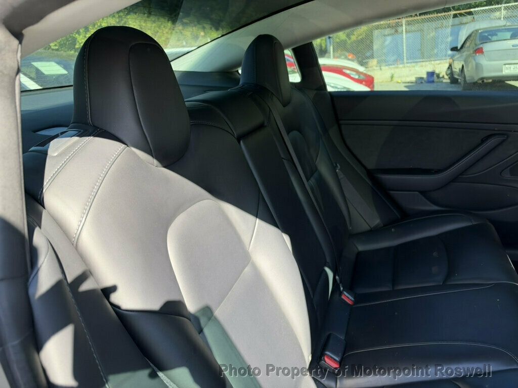 Tesla Model 3 photo 13