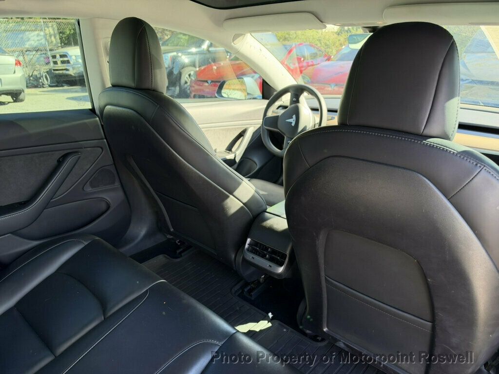 Tesla Model 3 photo 14