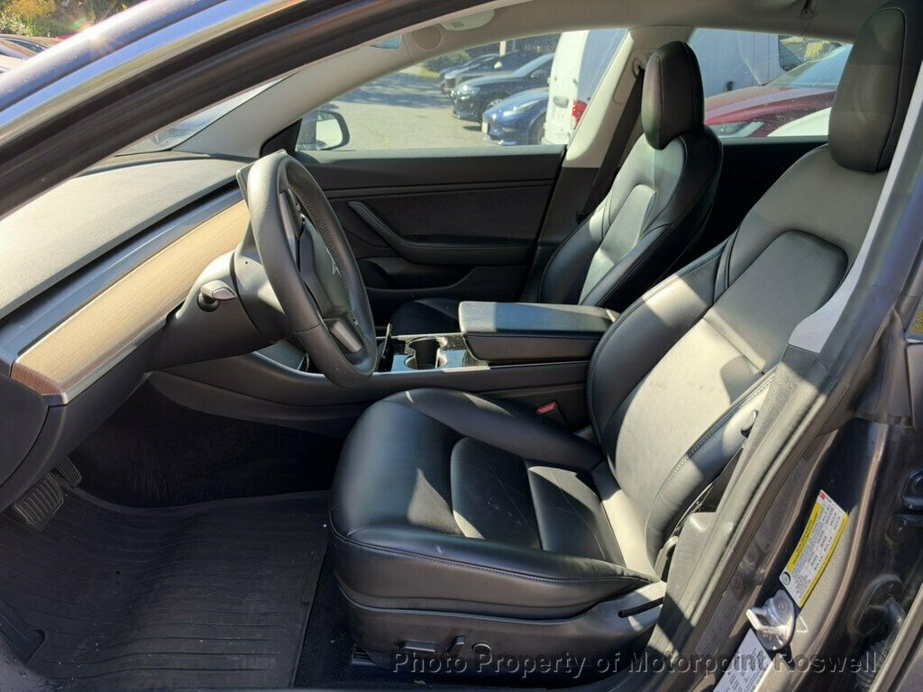 Tesla Model 3 photo 4