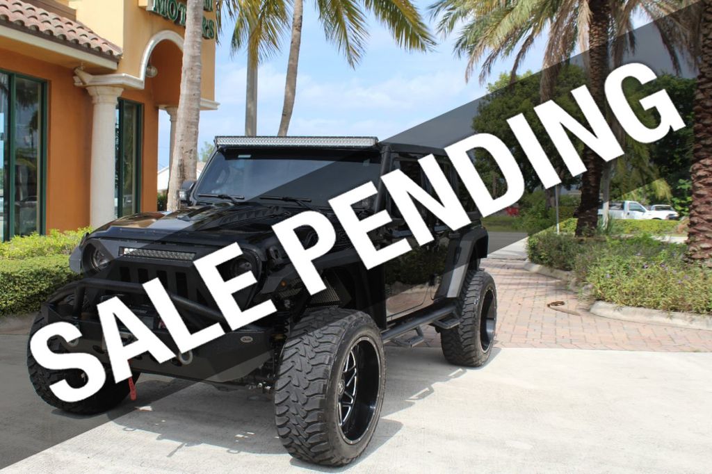 2020 Jeep Wrangler Unlimited  ONE FL OWNER. OVER $ 28K IN UPGRADES.TURBO 8 SPEED AUTOMATIC - 21080244 | Video 1