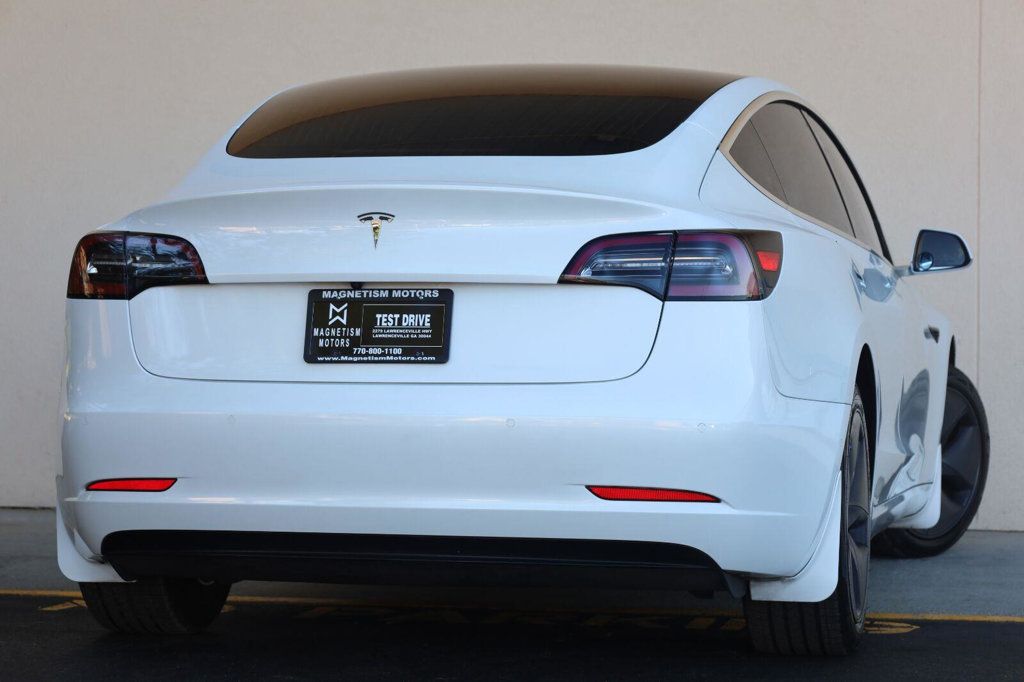Tesla Model 3 photo 11