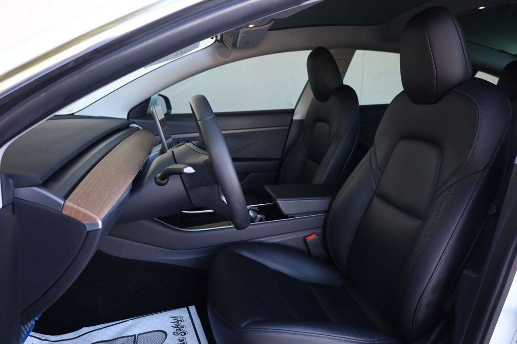 Tesla Model 3 photo 18
