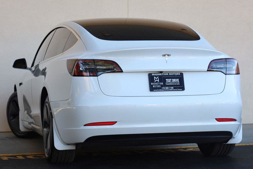 Tesla Model 3 photo 9