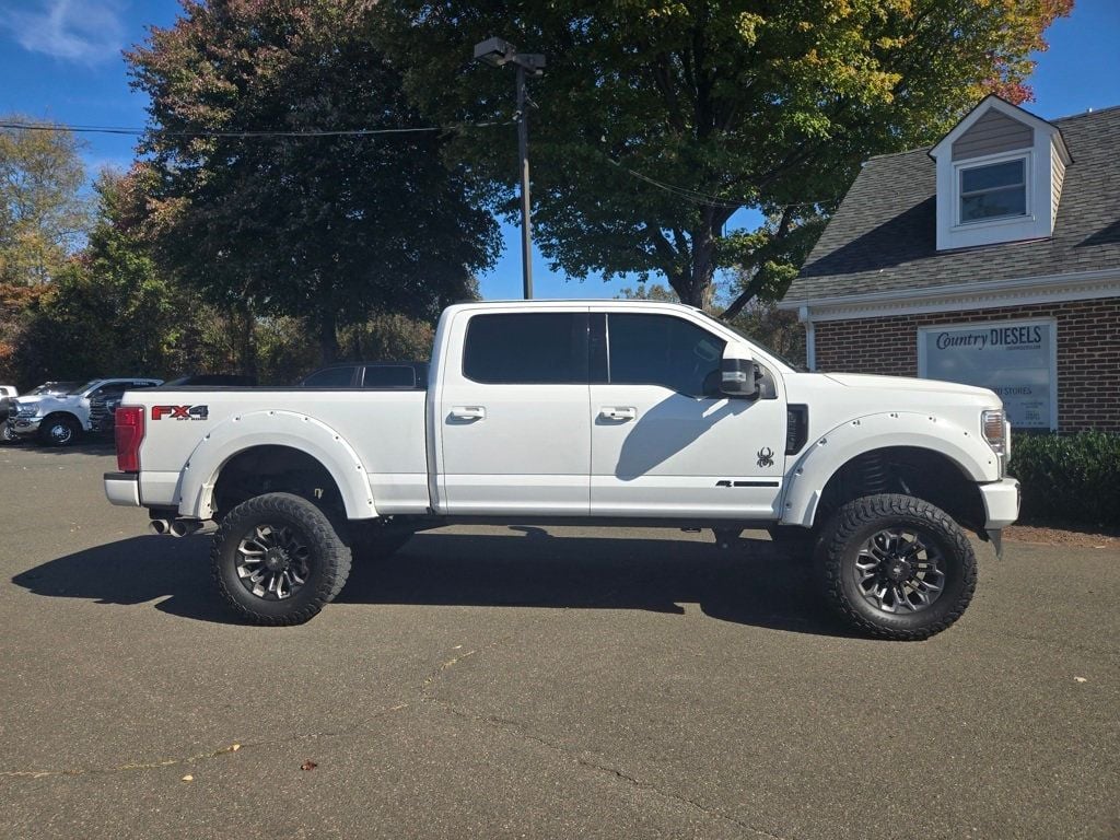 2021 Ford Super Duty F-250 SRW Lariat Ultimate Lifted *BLACK WIDOW* FX4 - 22650636 - 1