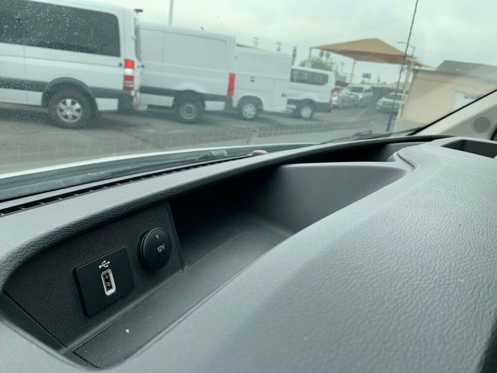 2021 Ford Transit Cargo Van T-150 130" Low Rf 8670 GVWR RWD - 23023643 - 64