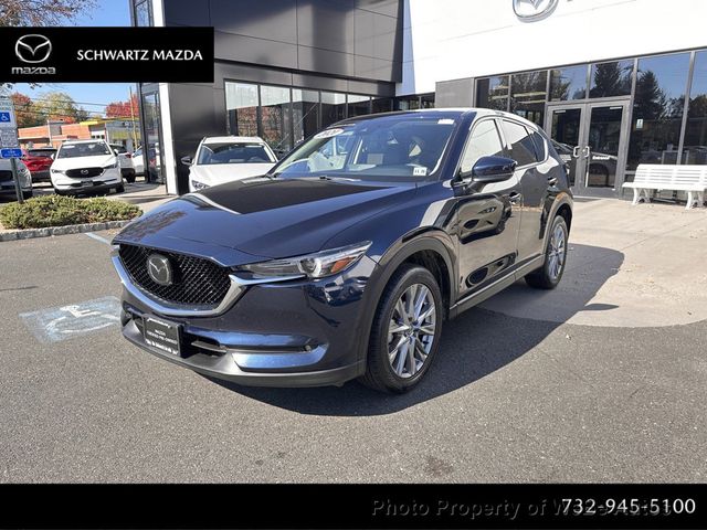 Certified 2021 Mazda CX-5 Grand Touring with VIN JM3KFBDM9M0470797 for sale in Riverhead, NY