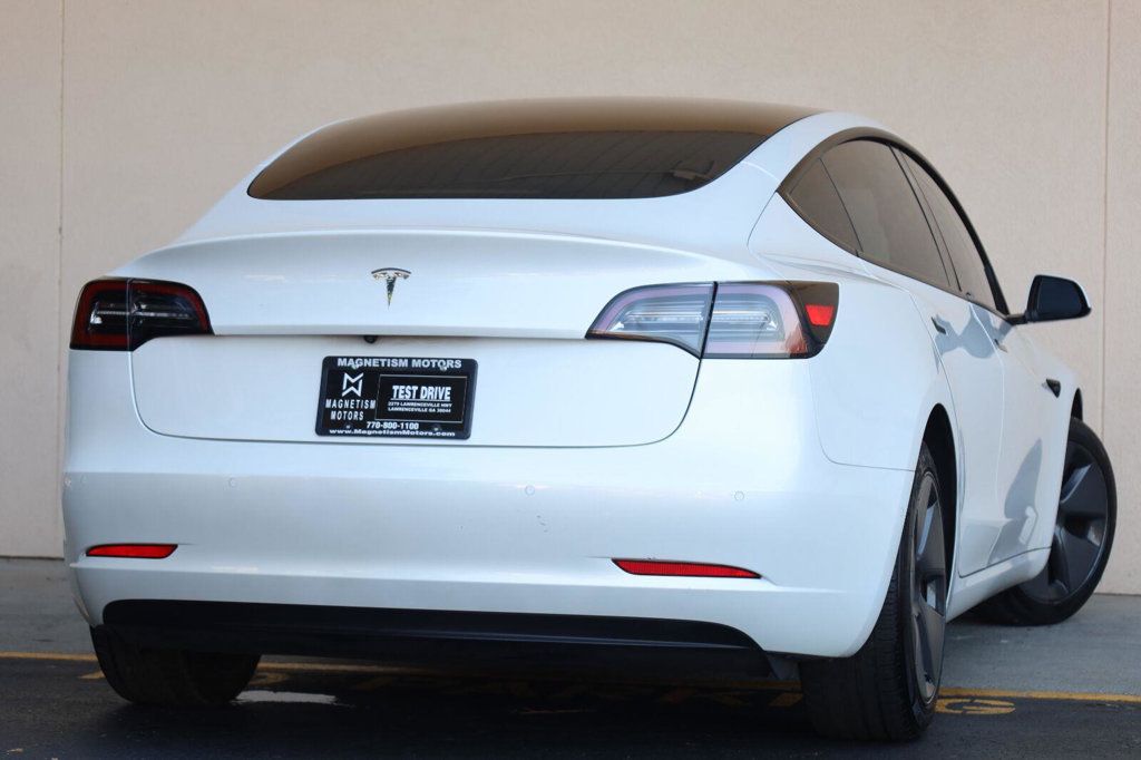 Tesla Model 3 photo 11