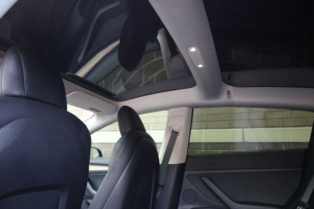 Tesla Model 3 photo 21
