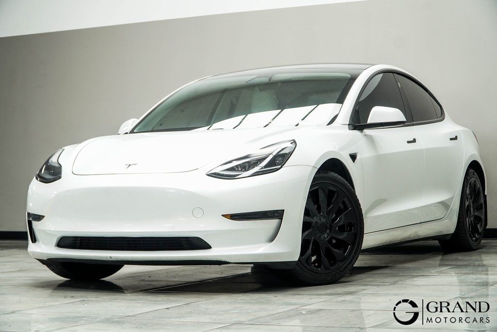 Used 2021 Tesla Model 3 Base with VIN 5YJ3E1EA8MF978517 for sale in Kennesaw, GA