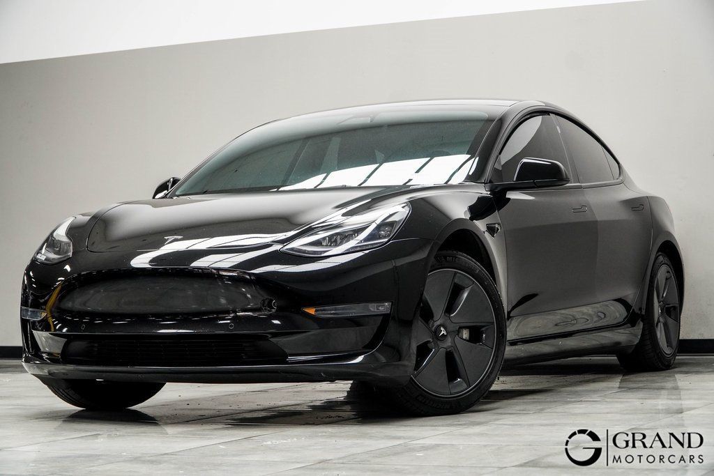 Used 2021 Tesla Model 3 Base with VIN 5YJ3E1EA0MF098797 for sale in Kennesaw, GA