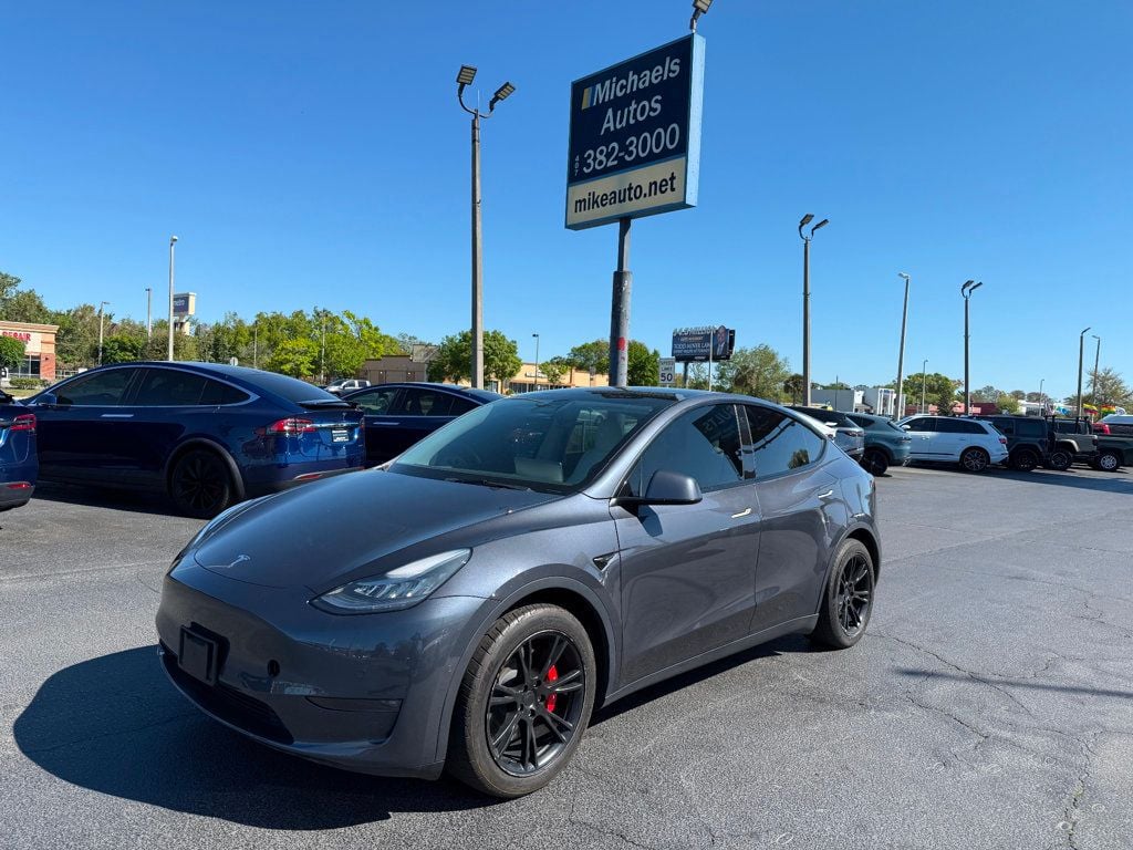 2021 Tesla Model Y **Long Range** 7 PASSENGERS** - 22791275 - 0