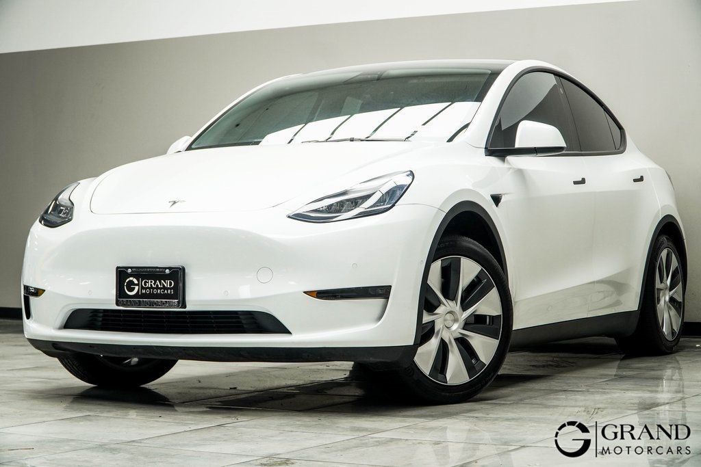 Used 2021 Tesla Model Y Standard Range with VIN 5YJYGAED3MF136341 for sale in Kennesaw, GA