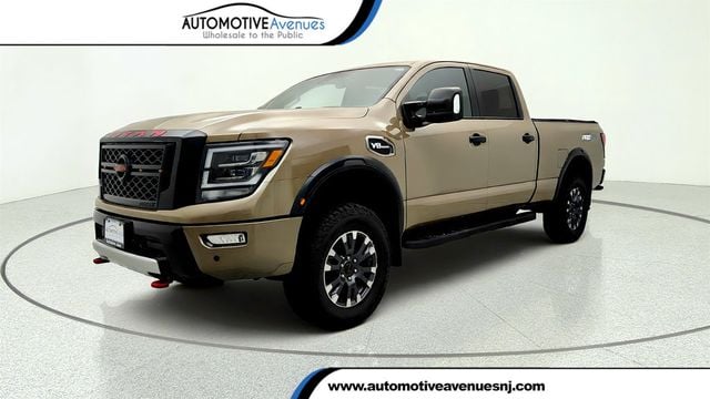 2022 Nissan Titan XD 4x4 Crew Cab PRO-4X with Rugged Step Boards - 23057803 - 0