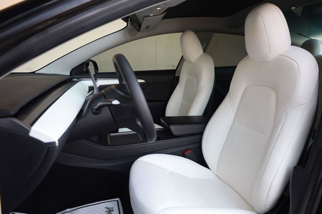 Tesla Model 3 photo 17