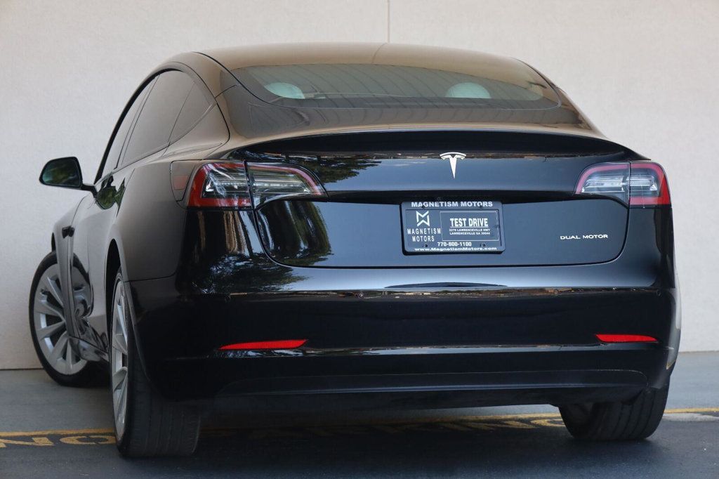 Tesla Model 3 photo 9