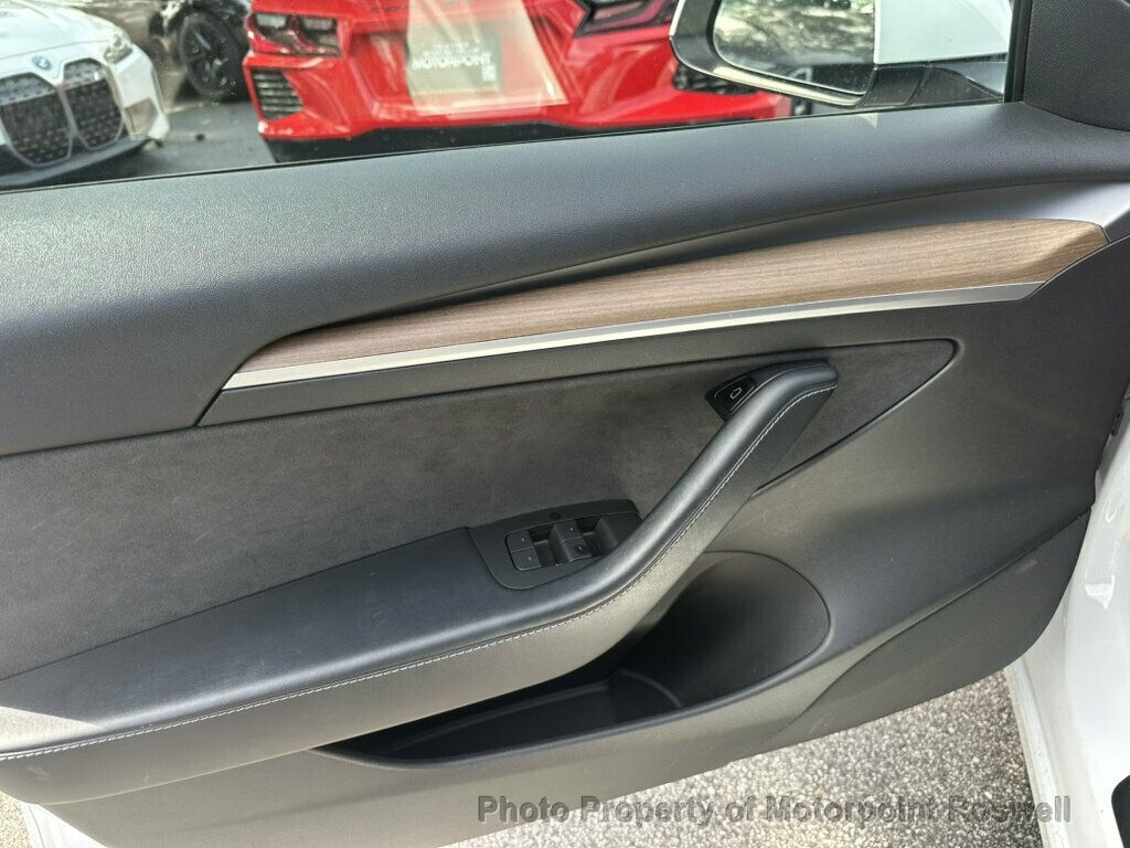 Tesla Model 3 photo 13