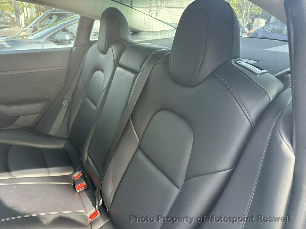 Tesla Model 3 photo 14