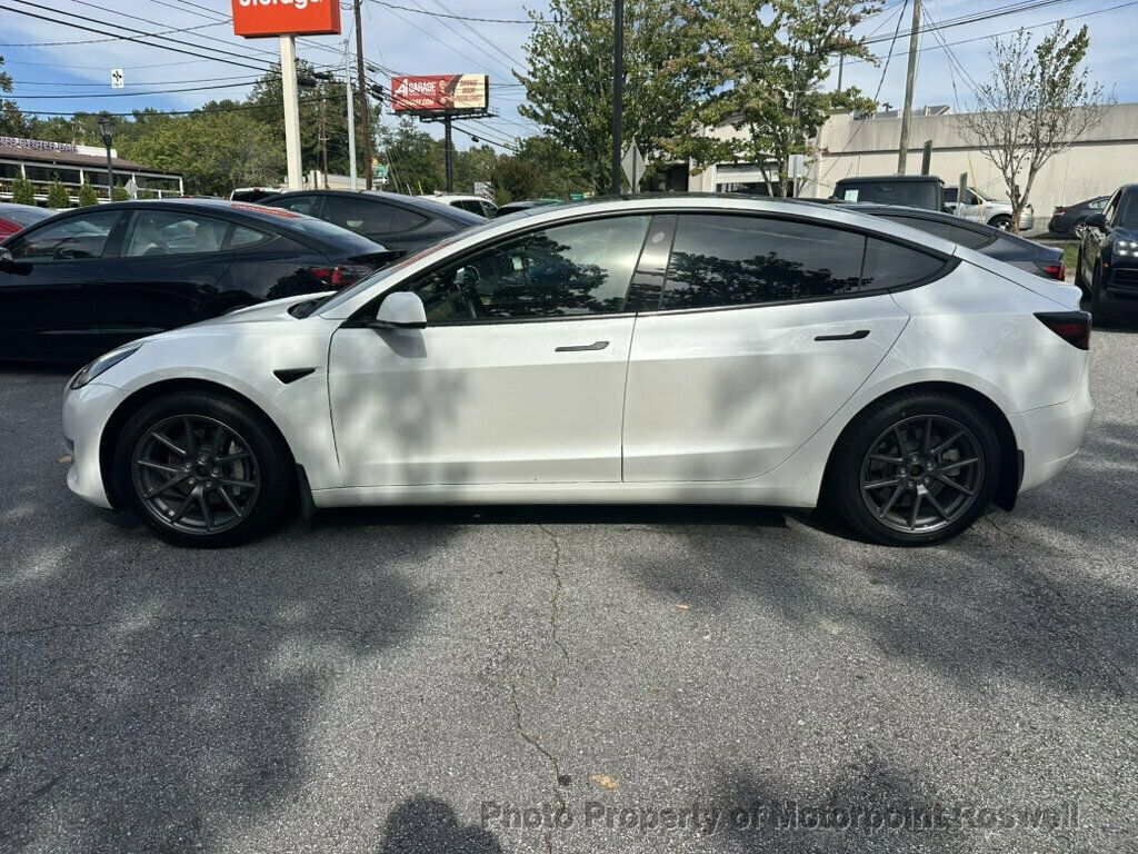 Tesla Model 3 photo 4