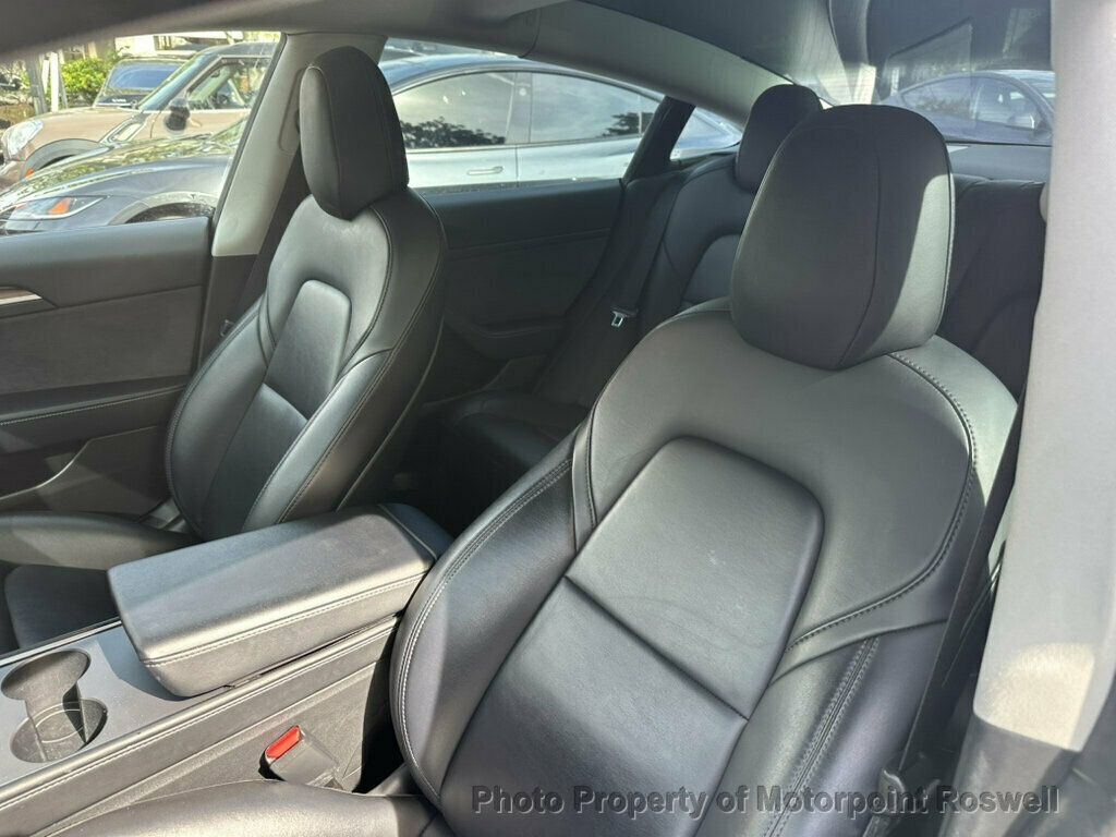 Tesla Model 3 photo 8