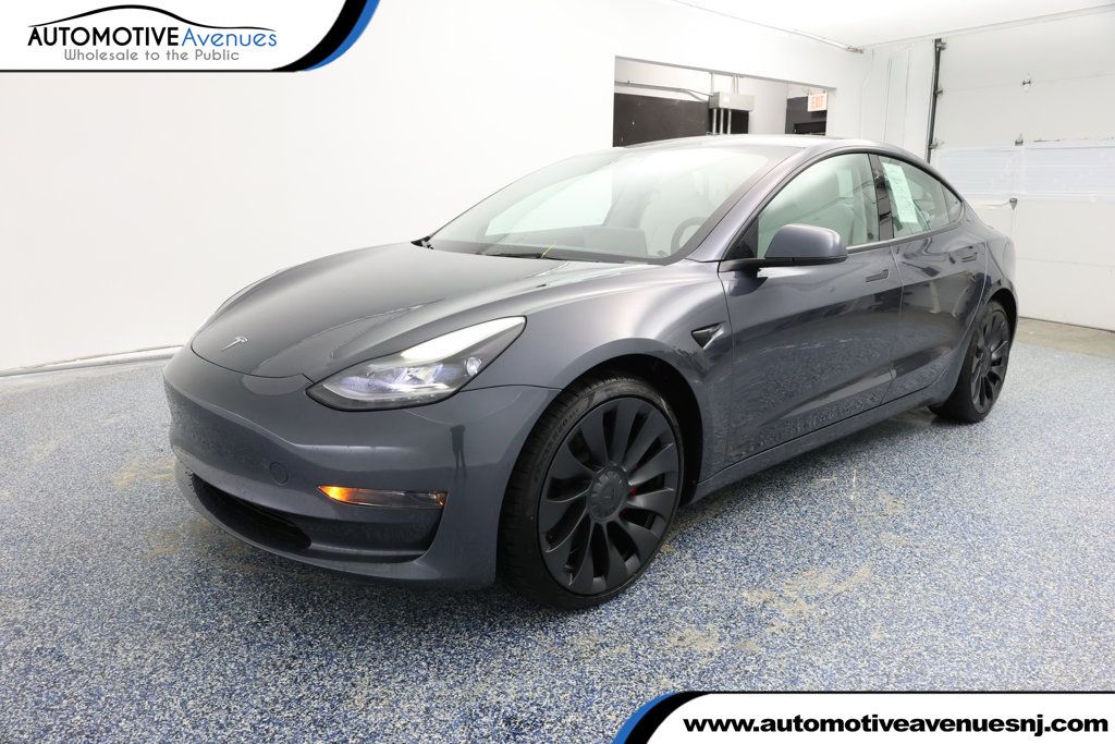 2022 Tesla Model 3 Performance AWD with White & Black Premium Interior - 22937909 | Video 1
