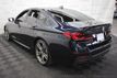 2023 BMW 5 Series M550i xDrive - 23009903 - 4