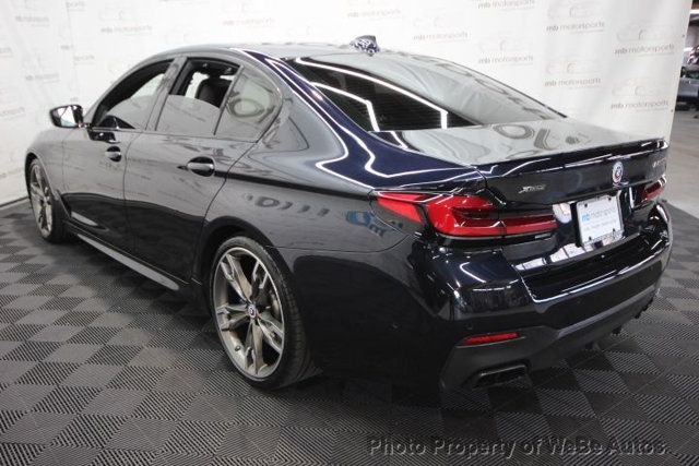 2023 BMW 5 Series M550i xDrive - 23009903 - 4