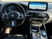 2023 BMW 5 Series M550i xDrive - 23099648 - 21