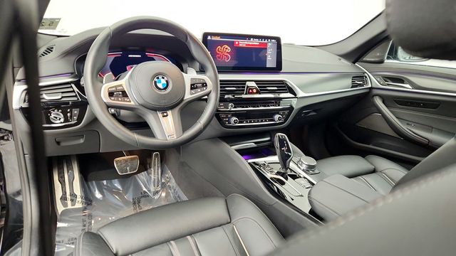 2023 BMW 5 Series M550i xDrive with Head-Up Display and Shadowline Package - 22957043 - 12