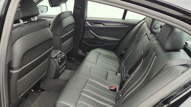 2023 BMW 5 Series M550i xDrive with Head-Up Display and Shadowline Package - 22957043 - 21