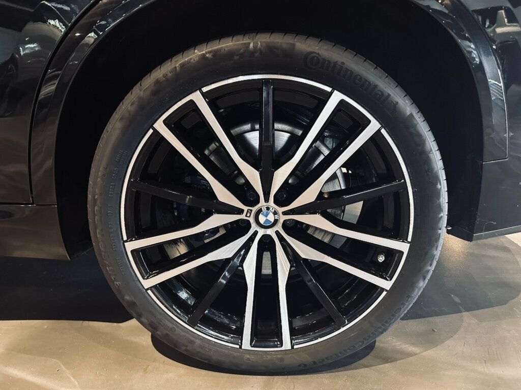 2023 BMW X5 MSRP$96,095/DrivingAssistanceProfessional Pkg/ClimateComfortPkg - 23056585 - 26