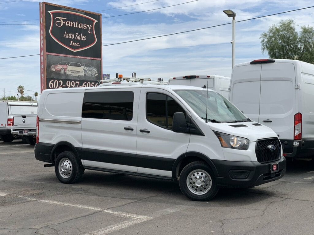 2023 Ford Transit Cargo Van T-150 130" Low Rf 8670 GVWR AWD 1-OWNER W/shelves - 23066798 - 0