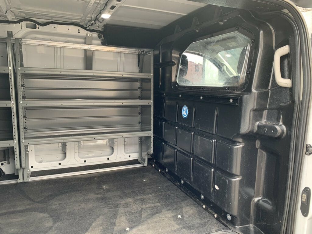 2023 Ford Transit Cargo Van T-150 130" Low Rf 8670 GVWR AWD 1-OWNER W/shelves - 23066798 - 10