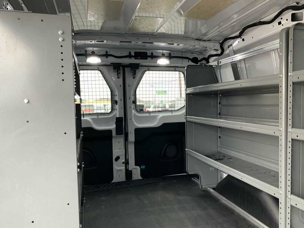2023 Ford Transit Cargo Van T-150 130" Low Rf 8670 GVWR AWD 1-OWNER W/shelves - 23066798 - 12