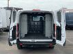 2023 Ford Transit Cargo Van T-150 130" Low Rf 8670 GVWR AWD 1-OWNER W/shelves - 23066798 - 1
