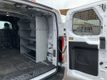 2023 Ford Transit Cargo Van T-150 130" Low Rf 8670 GVWR AWD 1-OWNER W/shelves - 23066798 - 3