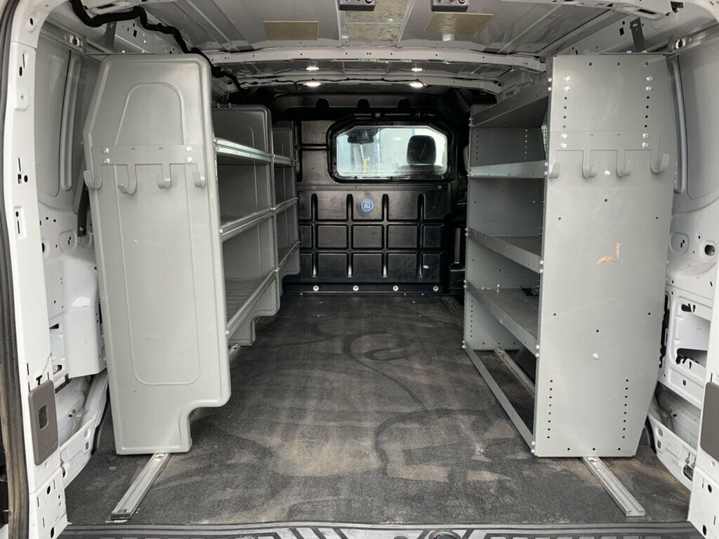 2023 Ford Transit Cargo Van T-150 130" Low Rf 8670 GVWR AWD 1-OWNER W/shelves - 23066798 - 4