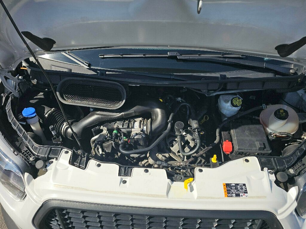 2023 Ford Transit Cargo Van T-250 148" EL Hi Rf 9070 GVWR RWD - 22984423 - 31