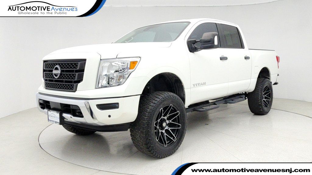 2023 Nissan Titan 4x4 Crew Cab SV with Convenience, Utility & Tow Packages, Lifted - 22943198 | Video 1